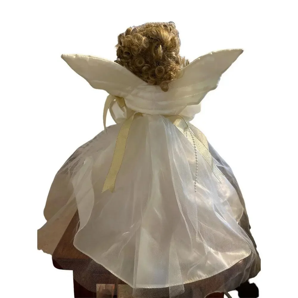Porcelain Doll Add a vintage touch to your Christmas tree with this beautiful An